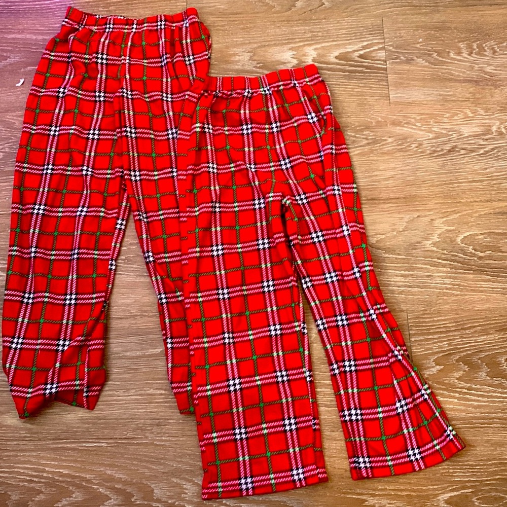 2 pc pj pants, one in a size 8 and the other In a 6. They are red and green.